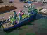 Grey supply vessel seen from above