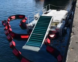 The flexible Environmental barge in port