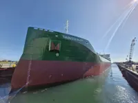 Green tanker in dock